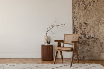 Elegant home styling featuring soft fabrics, sculptural objects, and earthy colors.