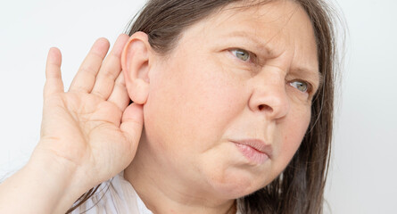 caucasian mature woman holding painful ear close up, hearing loss, Ear Discomfort, Hearing Test,...