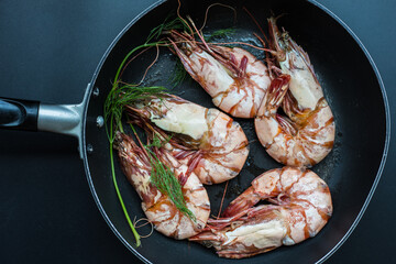 Sea giant shrimp grilled in black pan with vegetable spicy seafood grilled
