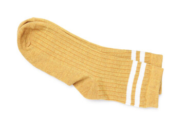 Pair of dark yellow socks isolated on white, top view