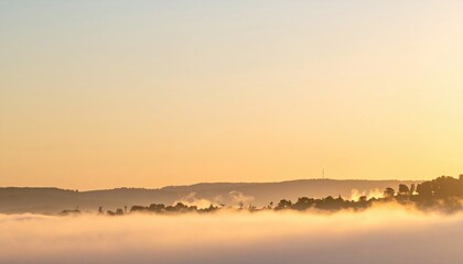 Fototapeta premium Misty sunrise over hills nature landscape photography tranquil environment serene viewpoint