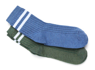 Pairs of stylish socks isolated on white, top view