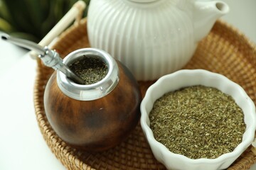 Traditional yerba mate tea on table, closeup