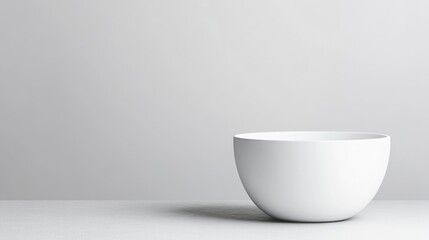 Empty white bowl on light gray background