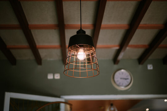 Pendant Light Fixture with Filament Bulb and Interior Design Element