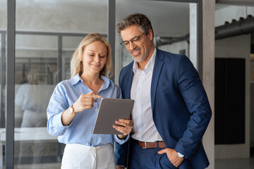 Two partners, colleagues, team of professional finance specialist business people working together....