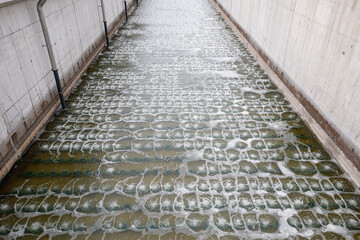 Biological treatment process in aeration basin closeup. Specialized equipment serves for breakdown...