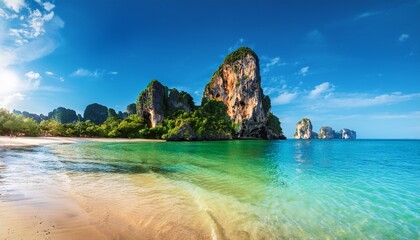 Fototapeta premium stunning view of railay beach in krabi with clear waters and limestone cliffs