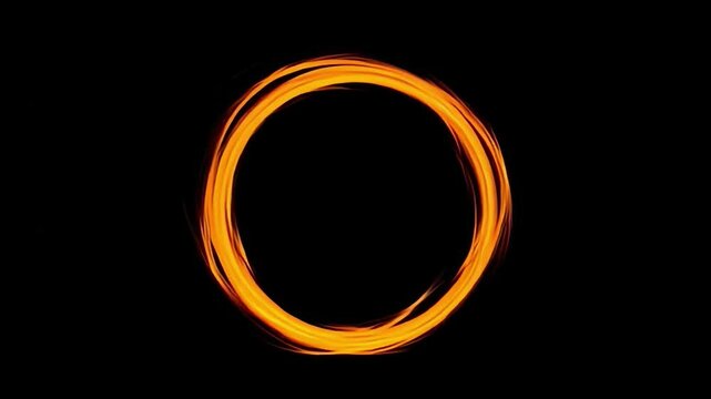 A Vivid Orange Oval Formed by Light Trails Against a Deep Black Background, Emphasizing Energy and Abstraction