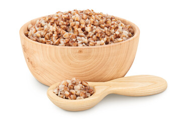 Boiled buckwheat in a wooden bowl isolated on white background