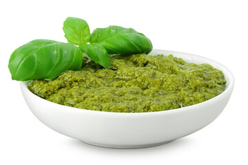 Pesto sauce in ceramic bowl isolated on white background. Top view. Flat lay