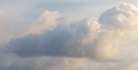 The sky is cloudy and the clouds are white