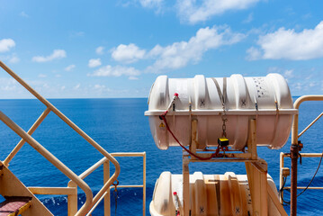 Close-up of a life rafts mounted on a merchant vessel, essential life-saving equipment for the crew...