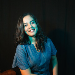 Young woman portrait with blue light