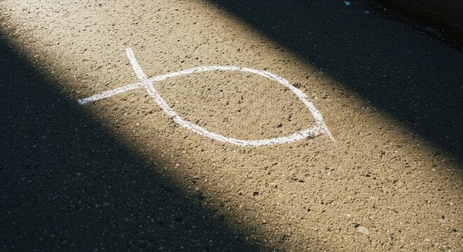 Ichthys fish symbol drawn with white chalk on grunge wall surface, Christian sign representing Christianity as a religious concept, perfect for modern Christian publication design or artwork.