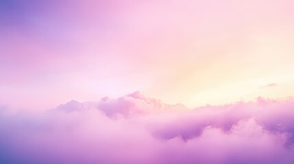 Obraz premium A soft pastel abstract background featuring a smooth pink to lavender gradient with cloud textures, perfect for romantic wedding invitations, beauty product packaging, and modern minimalist designs