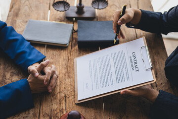 Lawyers provide legal advice and sign contracts, legal agreements. Lawyers are talking and...