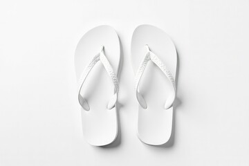 Pair of white flip-flops, isolated on bright white backdrop , pair, design