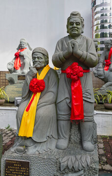 Kuala Lumpur, Malaysia - Feb. 19, 2025: Statue no.3 of the 24 Filial Exemplars collection at Thean Hou Temple, depicts Zeng Shen, who felt pain in his heart when his mother bit her finger