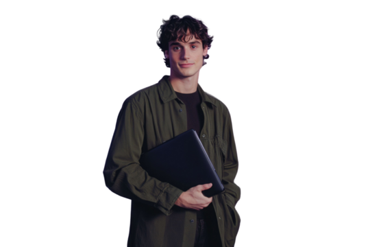 Young man standing holding laptop and looking at camera with happy smile, isolated on purple background PNG