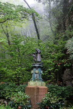 Bronze statue of St. Francis with the child