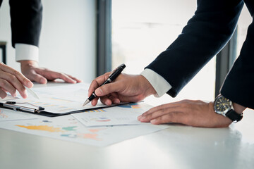 Team meeting focused on planning, strategy with data analysis for business growth financial...