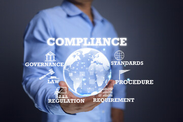 Compliance concept with businessman holding a globe to comply the international regulation requirement or standard and law for export and import the products for destination market