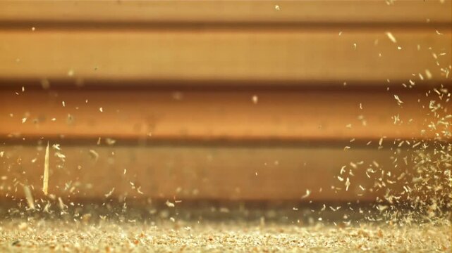 Wood sawdust on the carpenter's desktop. Filmed on a high-speed camera at 1000 fps. High quality FullHD footage