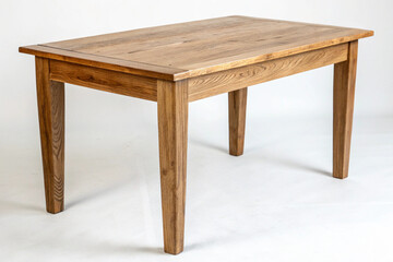 Handcrafted wooden table with smooth finish and natural grain, suitable for modern or farmhouse-style interiors.