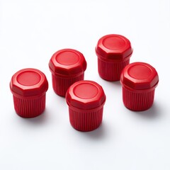 Five red caps arranged neatly isolated on white background