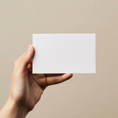 Fototapeta premium Hand holding blank business card.