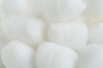 Many fluffy cotton balls as background, closeup