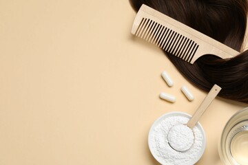 Collagen capsules, hair lock, powder, water and comb on beige background, flat lay. Space for text