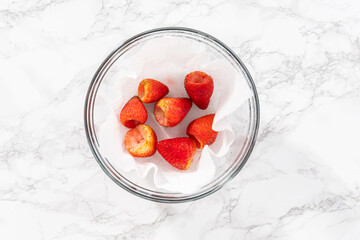 Washed and Dried Strawberries Neatly Stored in a Glass Bowl