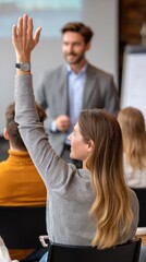 Fototapeta premium Attendee raising hand in a business seminar