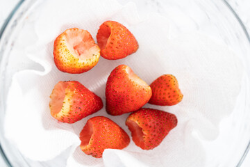 Washed and Dried Strawberries Neatly Stored in a Glass Bowl