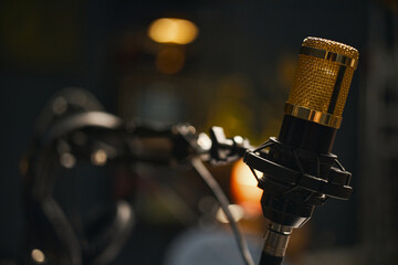 Close-up of microphone for recording interview or podcast in studio