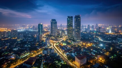 Aerial view of a vibrant city at twilight.  A busy urban intersection, modern skyscrapers, and residential areas are visible