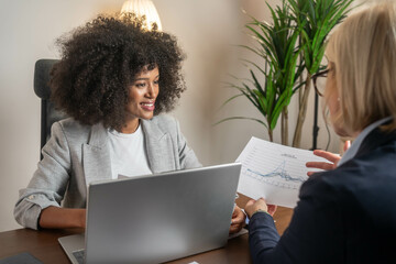 Legal consultancy concept. Business woman lawyer attorney showing document to man client providing...