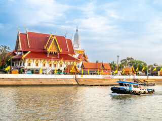 Wat Puttaisawan from the opposite side of Chaophraya river in Ayudhaya UNESCO World Heritage place under blue sky in summer