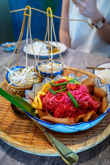 Red noodle in old fashioned Thai style menu, was served in traditional Thai food restaurant with decoration in old style