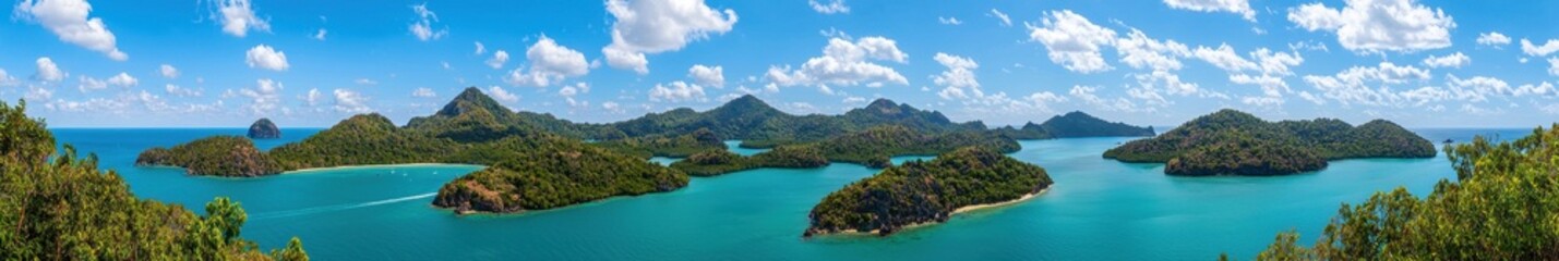 Obraz premium Stunning Tropical Islands Under Bright Blue Sky and Sparkling Water