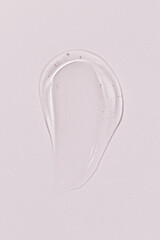 Cosmetic gel or beauty jelly serum texture background. Transparent skin care collagen product