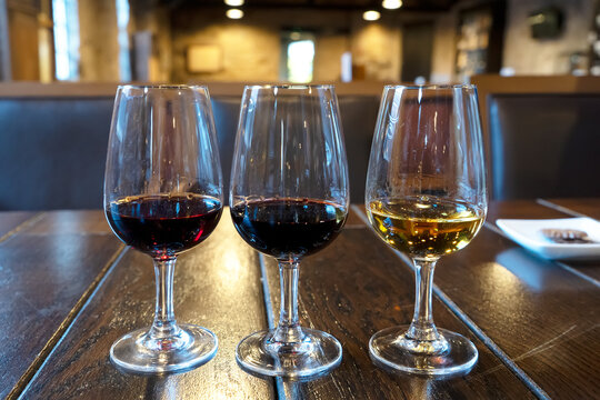 port wine testing, glasses with drink samples in bar