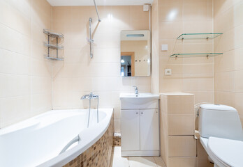 Modern Home Bright Bathroom Interior With Sink, Toilet, and Glass Shelving