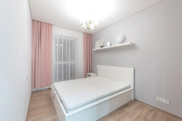 Minimalist Home Bedroom Interior with Soft Pink Curtains and Modern White Furniture