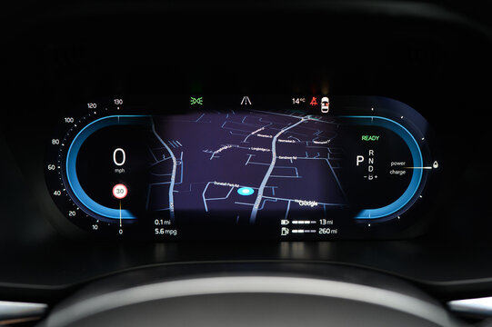 Virtual Cockpit, Digital Dashboard Displaying Map and Information About a Vehicle in Front of the Steering Wheel Including a Speedometer, Dials, Navigation, Music, and More