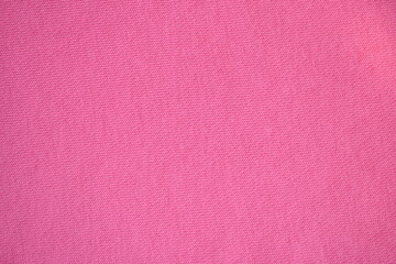Pink fleece fabric texture, macro texture fleece pink fabric photo above as background	
