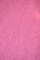 Fototapeta premium Pink fleece fabric texture, macro texture fleece pink fabric photo above as background 