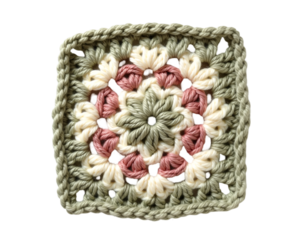 Detailed close up showcases the artistry in a hand stitched crochet granny square, highlighting the texture, design, and traditional craft technique